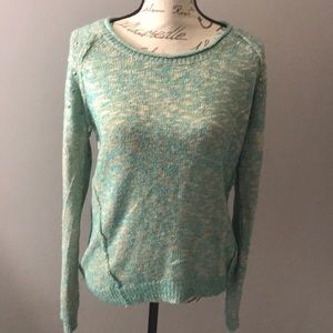 Sweater with studs on shoulder